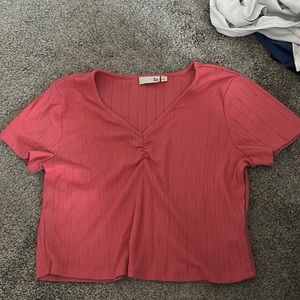 cropped pink shirt